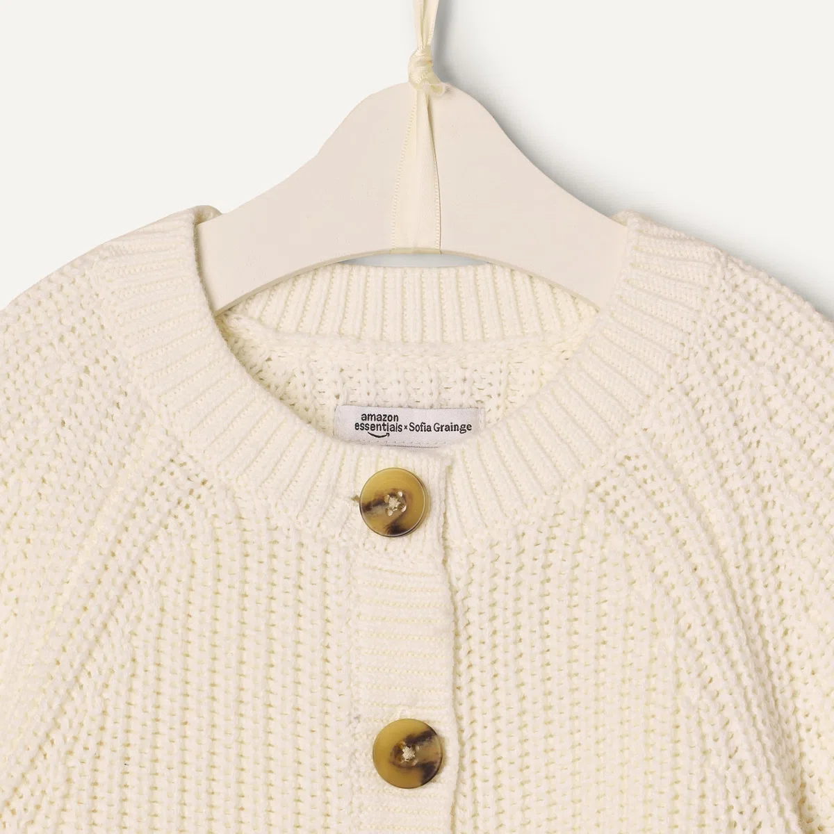 Amazon Essentials x Sofia Grainge Unisex Baby Spielanzug aus Strick