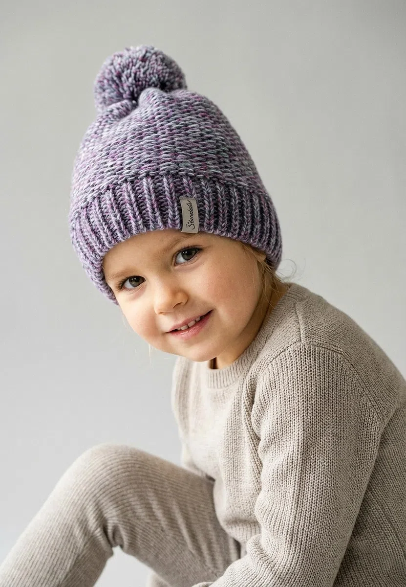 Sterntaler Strickmütze aus Multicolor Garn - Unisex Bommelmütze mit tollem Strickmuster - Kindermütze mit Futter aus wärmendem Microfleece - Wintermütze